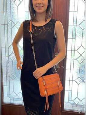 Rebecca Minkoff orange leather tassel fringe crossbody with gold hardware